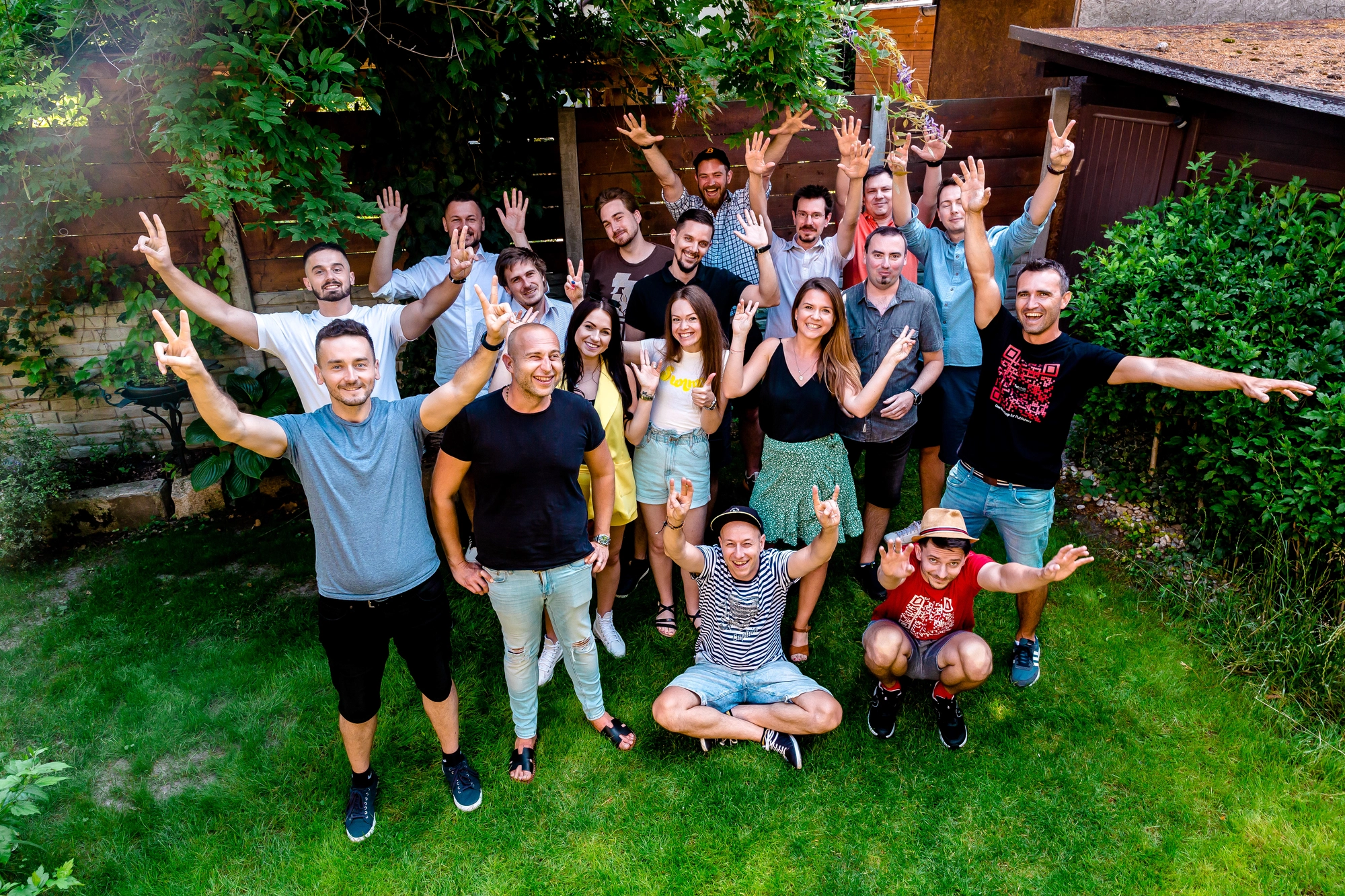 The FatChilli team gathered in a backyard.